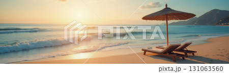 Wide panorama of seascape where in foreground sun lounger and umbrella on the beach, beautiful waves, beautiful sea background, summer vacation and travel concept 131063560