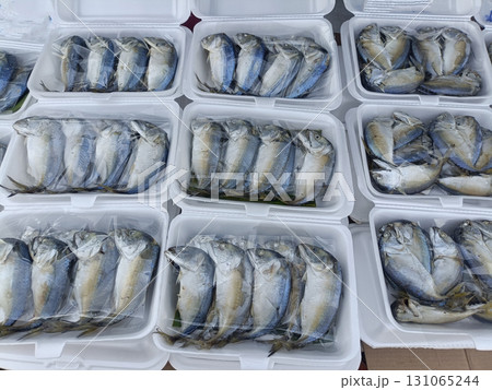 Fresh fish foam containers market, neatly arranged and ready for sale, showcasing variety of fish with shiny scales and clear eyes, fresh seafood 131065244