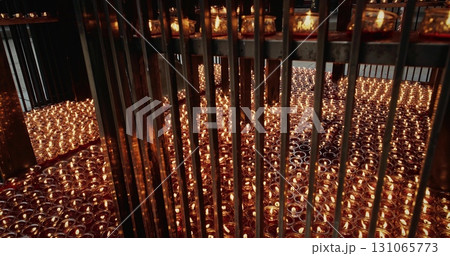 Chengdu, Sichuan, China. Religious Ritual In Temple. Many Oil Lamps Burning At Wenshu Monastery Buddhist Temple. Many Lit Candles In Buddhist Temple. Concept For Faith, Religion And Spirituality 131065773