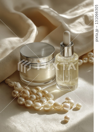Elegant skincare products with pearl accents on silky fabric, evoking luxury and beauty, perfect for sophisticated beauty routine or gift 131066305
