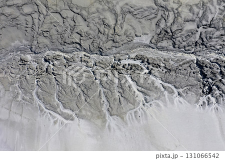Abstract mud cracks and patterns aerial view 131066542