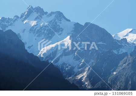 Beautiful snow-capped peaks of high mountains 131069105