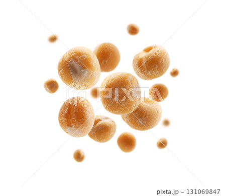 Dry yellow peas levitate on a white background Dry yellow peas levitate on a white background 131069847