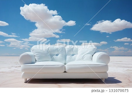 a white sofa on a blue sky background with clouds 131070075
