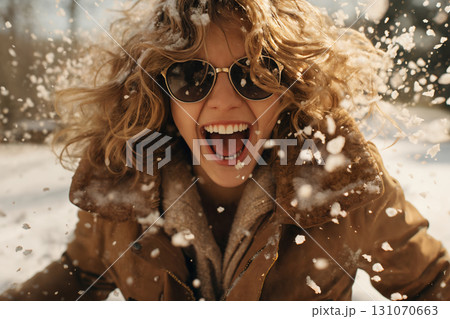 portrait of a beautiful happy woman enjoying winter season portrait of a beautiful happy woman enjoying winter season 131070663