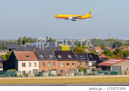 Belgium, Brussels Airport, Chinese Central Airlines plane over houses in Zaventem, Boeing 777 Belgium, Brussels Airport, Chinese Central Airlines plane over houses in Zaventem, Boeing 777 131072569