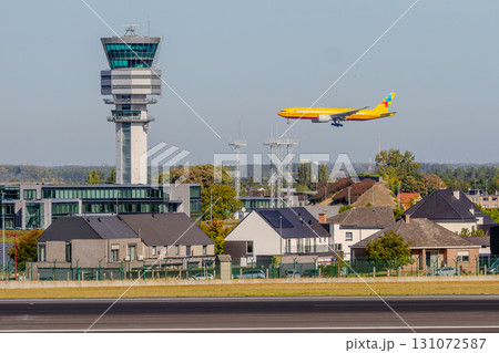 Belgium, Brussels Airport, Chinese Central Airlines plane in front of the Zaventem control tower, Boeing 777 Belgium, Brussels Airport, Chinese Central Airlines plane in front of the Zaventem control tower, Boeing 777 131072587