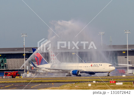 Belgium, Brussels Airport, Water salute, Delta Airlines plane doused by fire trucks. Boeing 767 Belgium, Brussels Airport, Water salute, Delta Airlines plane doused by fire trucks. Boeing 767 131072642