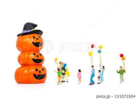 Family Gathering Around Jack O Lantern Pumpkin Stack Family Gathering Around Jack O Lantern Pumpkin Stack 131072804