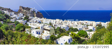 beautiful Greek islands - Nisyros (Dodecanese) panorama of Mandraki village with monastery beautiful Greek islands - Nisyros (Dodecanese) panorama of Mandraki village with monastery 131072995