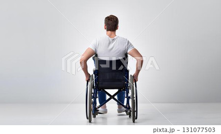 disabled man on wheelchair 131077503