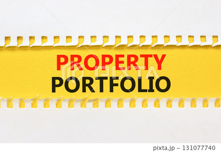 Property portfolio symbol. Concept words Property portfolio on beautiful yellow paper. Beautiful white paper background. Business Property portfolio concept. Copy space. 131077740
