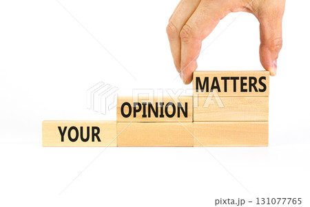 Your opinion matters symbol. Concept words Your opinion matters on beautiful wooden blocks. Beautiful white table white background. Businessman hand. Business your opinion matters concept. Copy space. Your opinion matters symbol. Concept words Your opinion matters on beautiful wooden blocks. Beautiful white table white background. Businessman hand. Business your opinion matters concept. Copy space. 131077765