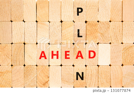 Plan ahead symbol. Concept word Plan ahead on beautiful wooden block wall. Beautiful wooden block wall background. Wooden blocks. Business plan ahead concept. Copy space. Plan ahead symbol. Concept word Plan ahead on beautiful wooden block wall. Beautiful wooden block wall background. Wooden blocks. Business plan ahead concept. Copy space. 131077874