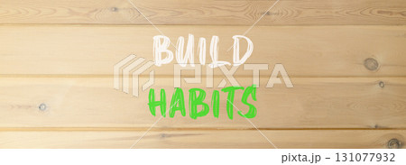 Build habits symbol. Concept word Build habits on beautiful wooden wall. Beautiful wooden wall background. Business build habits concept. Copy space. Build habits symbol. Concept word Build habits on beautiful wooden wall. Beautiful wooden wall background. Business build habits concept. Copy space. 131077932