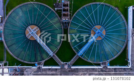 Aerial view circular clarifier tank at wastewater treatment plant, Industrial infrastructure, Environment technology sustainable water management system, Sedimentation tank circular clarifier. 131078102