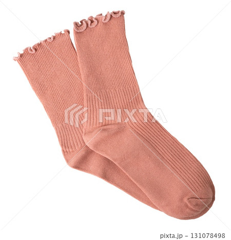 Soft pink ruffled socks on black background 131078498