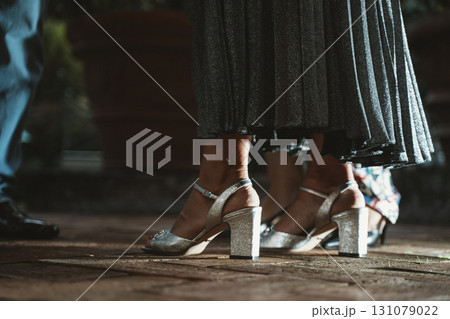 Elegant Dance Shoes in Motion at Evening Event Elegant Dance Shoes in Motion at Evening Event 131079022