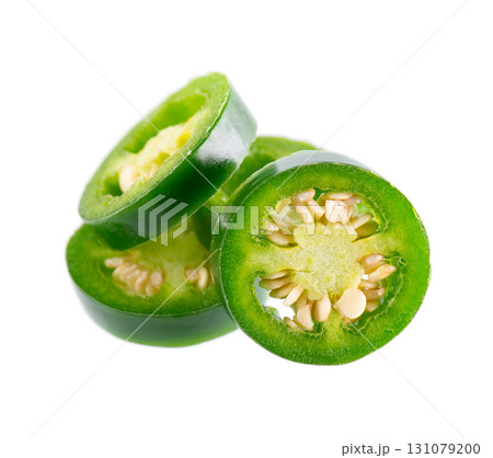 Fresh jalapeno pepper isolated on white background. Slices of green hot serrano pepper. Clipping path. 131079200