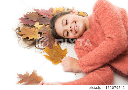 Little girl gorgeous long hair and fallen maple leaves lay on white background. Deep conditioning treatment. Haircare tips add to fall routine. Fall season. Shampoo care. Fall is here. Organic mask Little girl gorgeous long hair and fallen maple leaves lay on white background. Deep conditioning treatment. Haircare tips add to fall routine. Fall season. Shampoo care. Fall is here. Organic mask 131079241