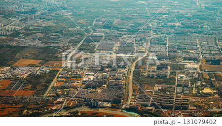 Beijing, China. View From Airplane Window On Multi-story Buildings Of Changhe Garden District In Beijing. Aerial View On Suburb. High-rise Houses Elevated View Cityscape Skyline. Urban Residential Beijing, China. View From Airplane Window On Multi-story Buildings Of Changhe Garden District In Beijing. Aerial View On Suburb. High-rise Houses Elevated View Cityscape Skyline. Urban Residential 131079402