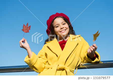 No rush. good weather mood. parisian girl trendy look. school time. maple syrup. canada. happy small girl. autumn kid fashion. child maple leaf. kid in french beret. leaf fall. favorite season 131079577
