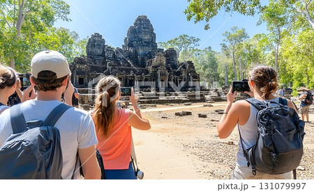 Tourists Photographing Ancient Temple Ruins Under Bright Sunligh Tourists Photographing Ancient Temple Ruins Under Bright Sunligh 131079997