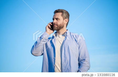communication of man talking on phone. man talking on smartphone. man communication talk communication of man talking on phone. man talking on smartphone. man communication talk 131080116
