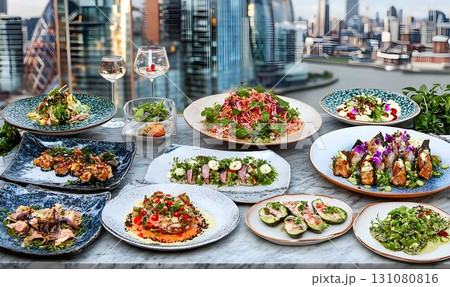 Exquisite rooftop dining experience with diverse salads and city 131080816