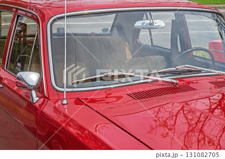 View on interior of retro car through windshield from the side of hood 131082705