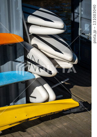 City SUP station offering paddleboard rental for water recreation on urban rivers and canals 131083040