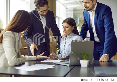 Group of business people having a meeting in office, signing a contract on workplace. 131088118