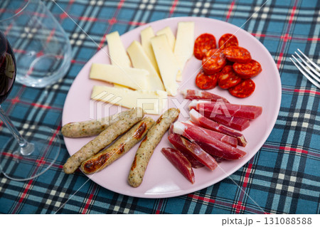 Traditional spanish snack tapas on a plate 131088588