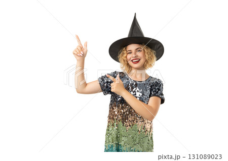 Young woman in a witch hat, excited for Halloween, isolated on white, PNG Young woman in a witch hat, excited for Halloween, isolated on white, PNG 131089023