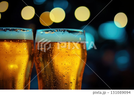 Glowing Beer Glasses at Night Festive Garden 131089094