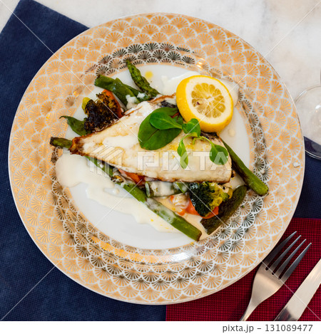 Delicious fish dish - dorado fish fillet served with vegetables Delicious fish dish - dorado fish fillet served with vegetables 131089477
