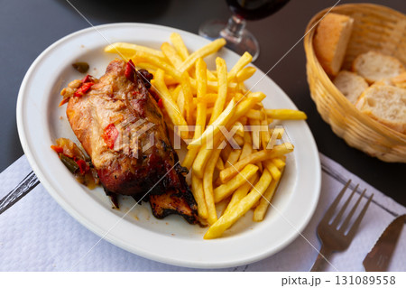Pork knuckle with french fries 131089558