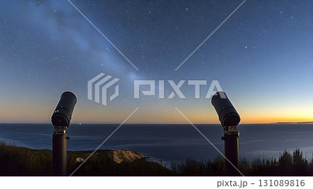 Two Telescopes Gaze at the Milky Way Over the Ocean at Dusk 131089816
