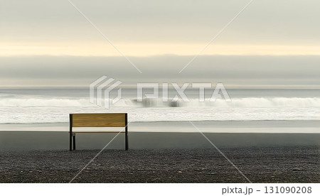 Wooden bench on sandy beach calm ocean cloudy sky 131090208