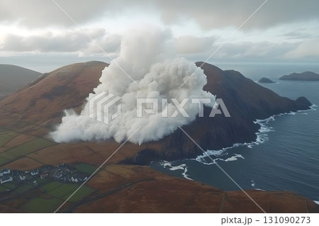 Dramatic coastal landscape with a large cloud formation over a b 131090273