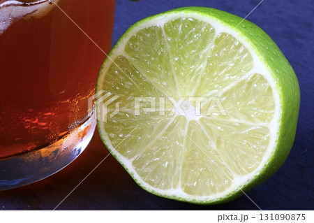 Glass of iced tea with lime Glass of iced tea with lime 131090875