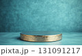 Smooth Matte Silver Round Podium on a Textured Turquoise Background 131091217