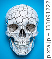 Realistic Pirate Skull Design with Scarred and Cracked Features on Vibrant Background 131091222
