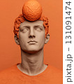 Minimalist 3D Clay Sculpture of a Man with an Orange Ball on His Head 131091474
