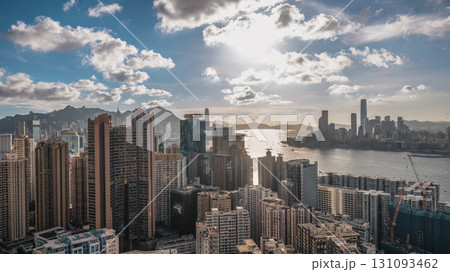 Aug 1 2025 Panoramic View of a Modern City Skyline Under a Bright Blue Sky 131093462