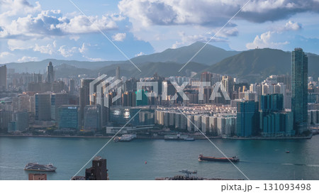 Aug 1 2025 View of a Bustling City Along a Large Waterfront Under Blue Sky Aug 1 2025 View of a Bustling City Along a Large Waterfront Under Blue Sky 131093498