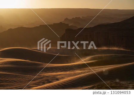 Golden Sands A Serene Desert Landscape Captured Beautifully at Sunset 131094053