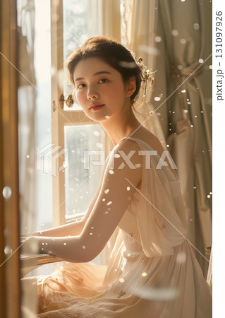 窓辺でくつろぐお洒落な大人の日本人美女（縦写真） 131097926