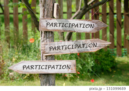 Application advertisement easy and comfortable usage concept, PARTICIPATION written on Wooden signs indicating the directions of movement Application advertisement easy and comfortable usage concept, PARTICIPATION written on Wooden signs indicating the directions of movement 131099689