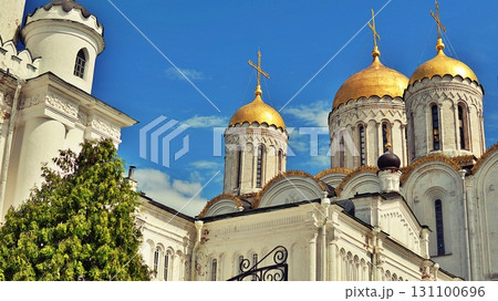 An ancient Christian Orthodox church stands against a blue sky backdrop. An ancient Christian Orthodox church stands against a blue sky backdrop. 131100696